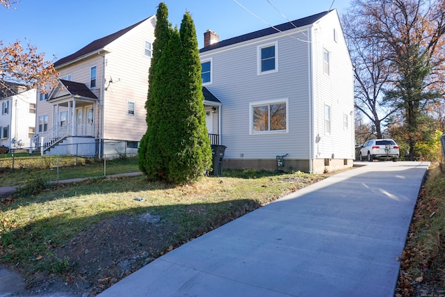 view of home's exterior featuring a lawn