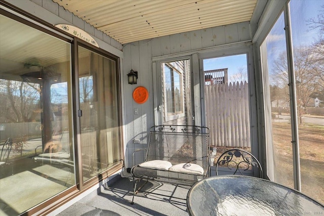 sunroom / solarium with wood ceiling