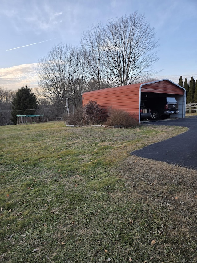 view of yard with a carport