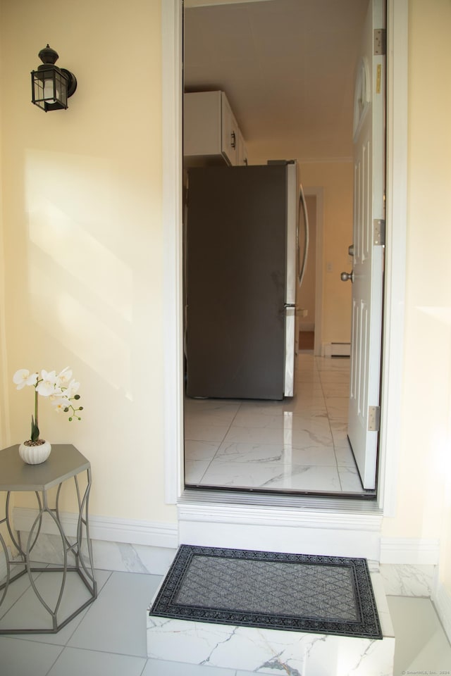 hallway with a baseboard radiator