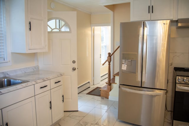 kitchen featuring wall oven, white cabinets, a baseboard radiator, and stainless steel refrigerator with ice dispenser