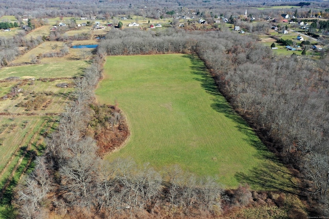 birds eye view of property featuring a rural view