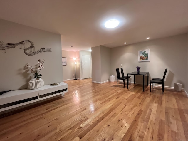 sitting room with light hardwood / wood-style floors