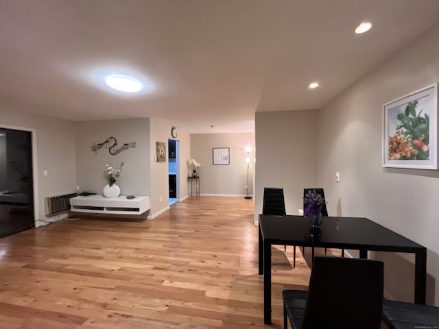 dining area featuring light wood-type flooring