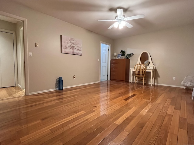 interior space featuring hardwood / wood-style floors and ceiling fan