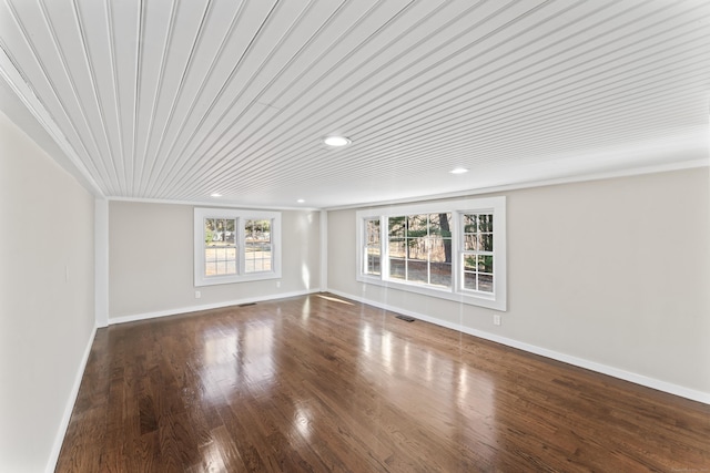 empty room featuring hardwood / wood-style flooring