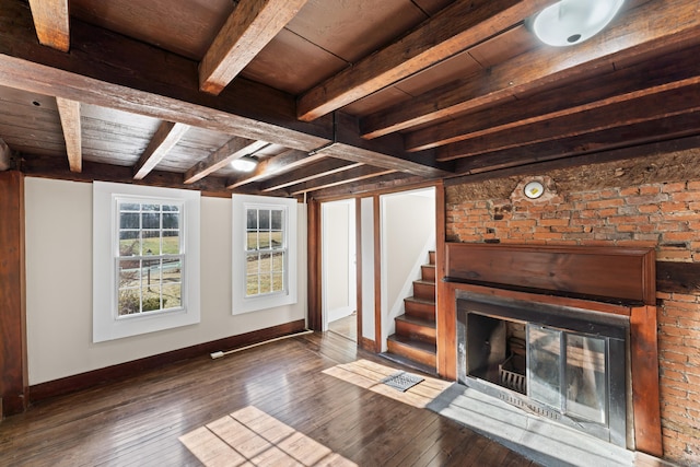 basement with wood ceiling and dark hardwood / wood-style floors