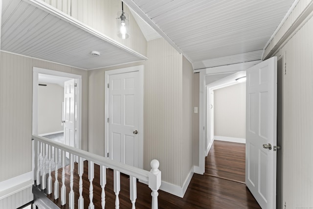 hall with dark hardwood / wood-style floors