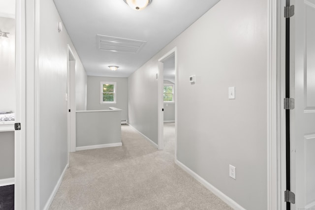 hallway with light carpet