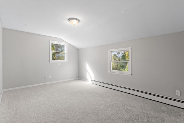 bonus room featuring carpet flooring, baseboard heating, and lofted ceiling