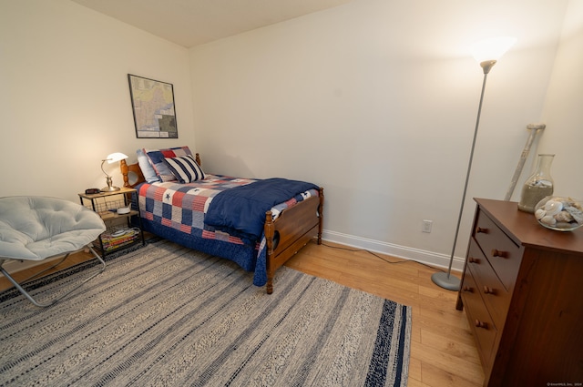 bedroom featuring light hardwood / wood-style flooring