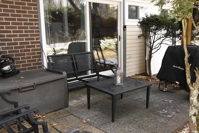 view of patio featuring a grill