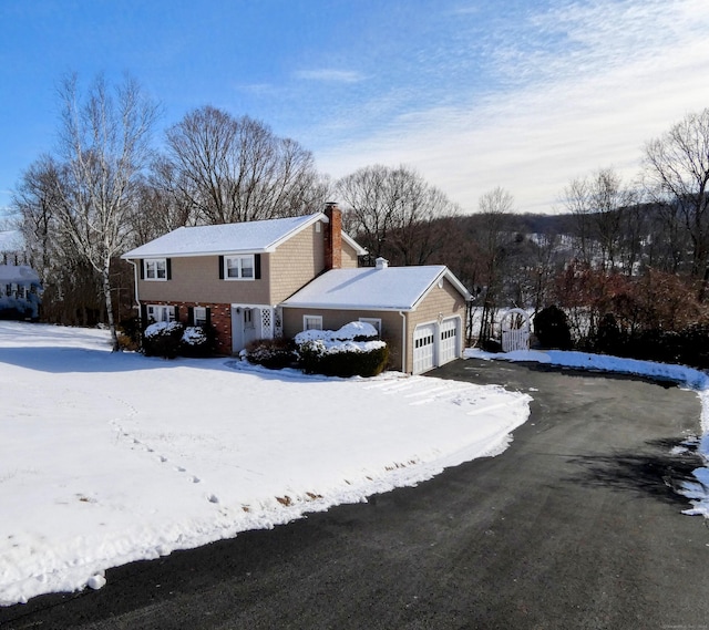 view of front of home with a garage