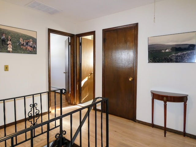 hallway featuring light hardwood / wood-style floors