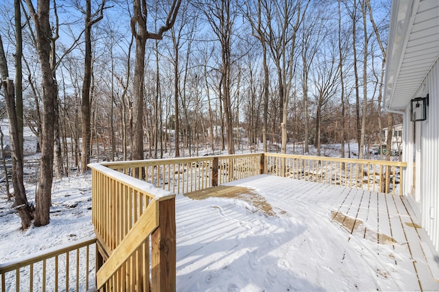 view of snow covered deck