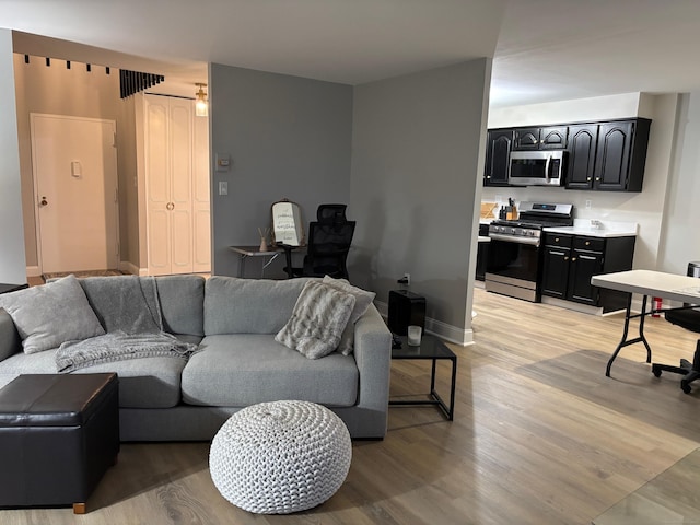 living room featuring light wood-type flooring