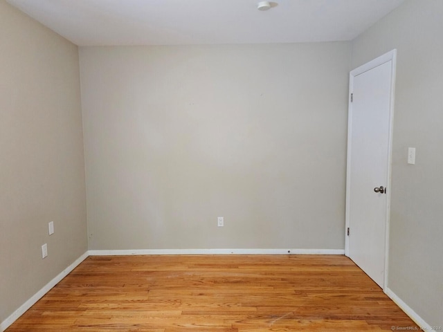 unfurnished room featuring light hardwood / wood-style flooring