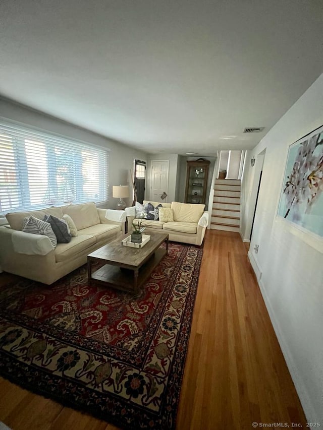 living room with light hardwood / wood-style flooring