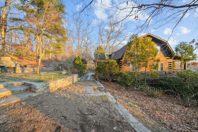 view of yard with a deck