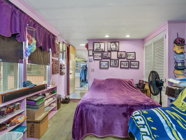 bedroom with light colored carpet and ornamental molding