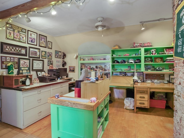 home office with lofted ceiling, ceiling fan, light wood-type flooring, and rail lighting