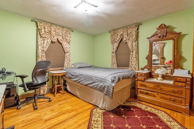 bedroom featuring hardwood / wood-style floors