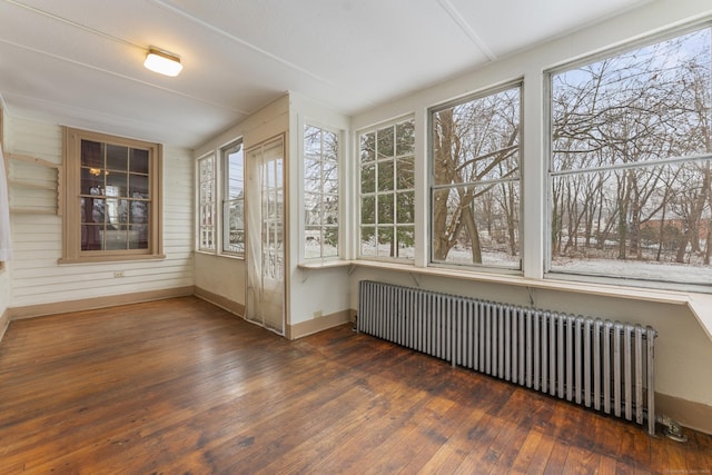 unfurnished sunroom with radiator