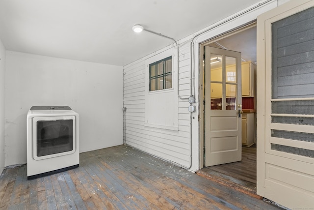 laundry room featuring washer / clothes dryer and dark wood-type flooring