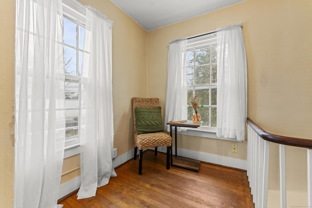 sitting room with hardwood / wood-style flooring