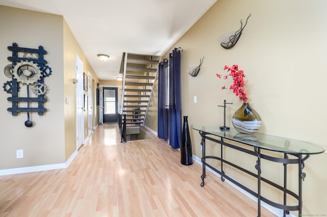 corridor featuring hardwood / wood-style floors