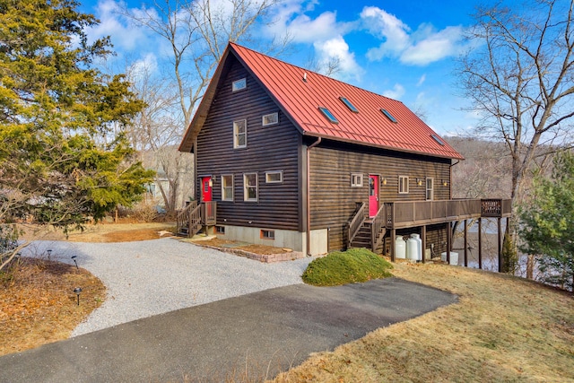 exterior space featuring a wooden deck