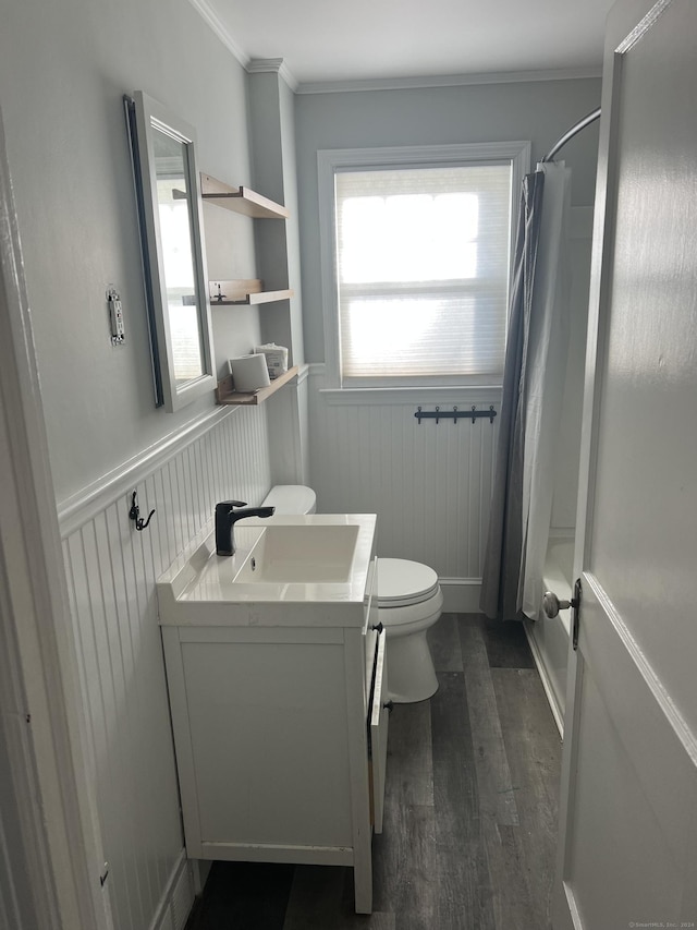 full bathroom featuring wood-type flooring, toilet, plenty of natural light, and shower / bath combo