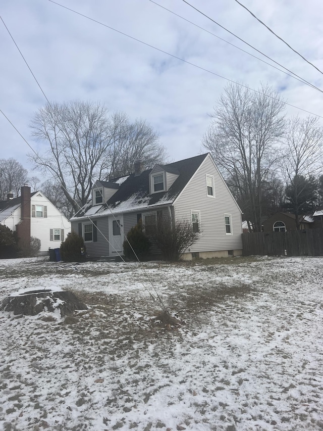 view of snow covered house