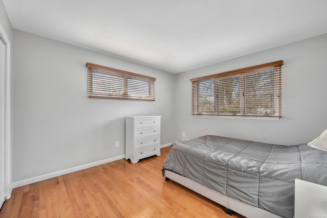 bedroom with light wood-type flooring