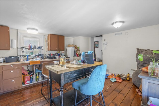 kitchen featuring dark hardwood / wood-style floors