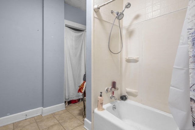 bathroom with shower / bath combo with shower curtain