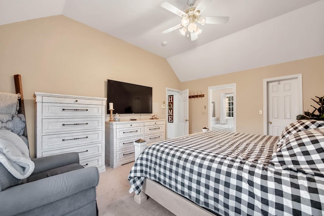 carpeted bedroom featuring ceiling fan and vaulted ceiling