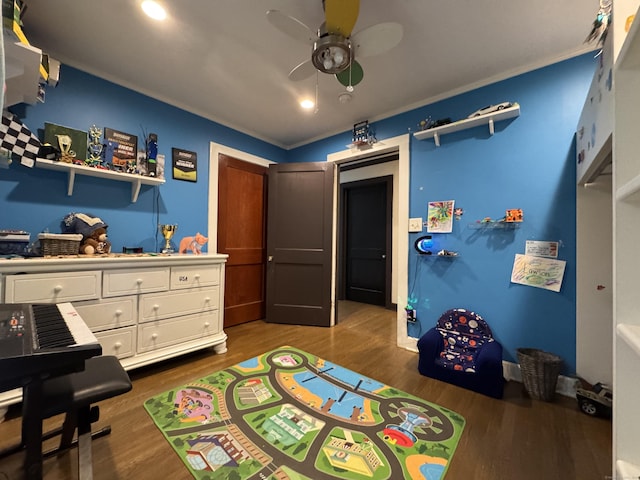 bedroom featuring dark hardwood / wood-style floors and ceiling fan