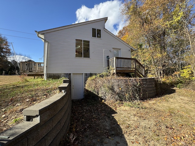 rear view of house with a deck