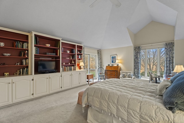 carpeted bedroom featuring vaulted ceiling and ceiling fan