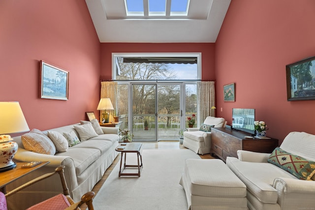 living room featuring high vaulted ceiling