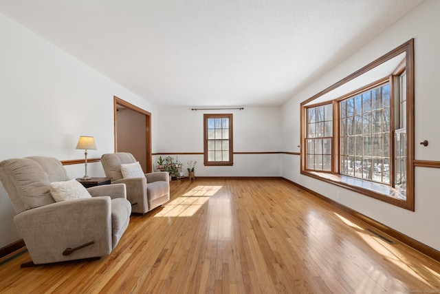 living room featuring light wood-type flooring