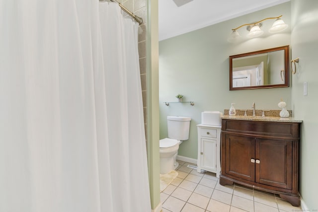 bathroom featuring vanity, tile patterned floors, toilet, and walk in shower