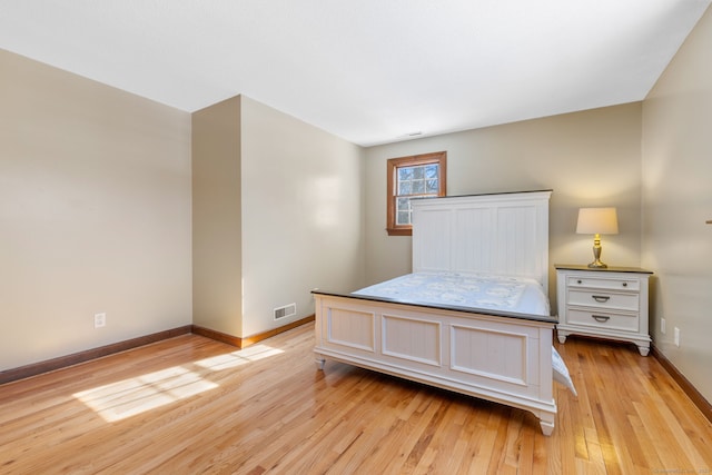 bedroom featuring light wood-type flooring