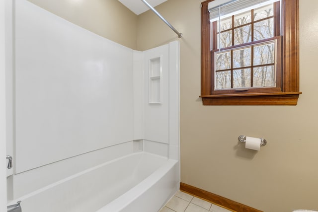 bathroom with tile patterned flooring and shower / bathing tub combination