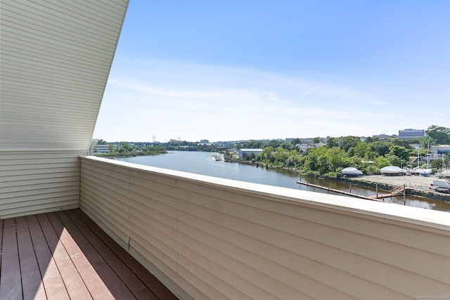 balcony featuring a water view