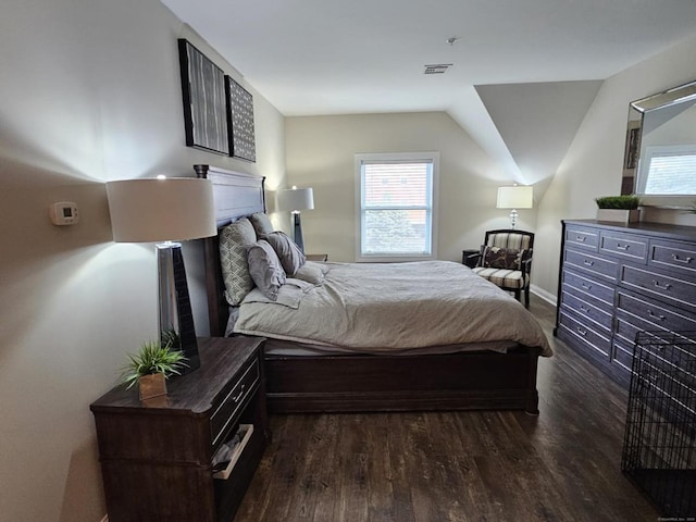 bedroom featuring dark hardwood / wood-style flooring