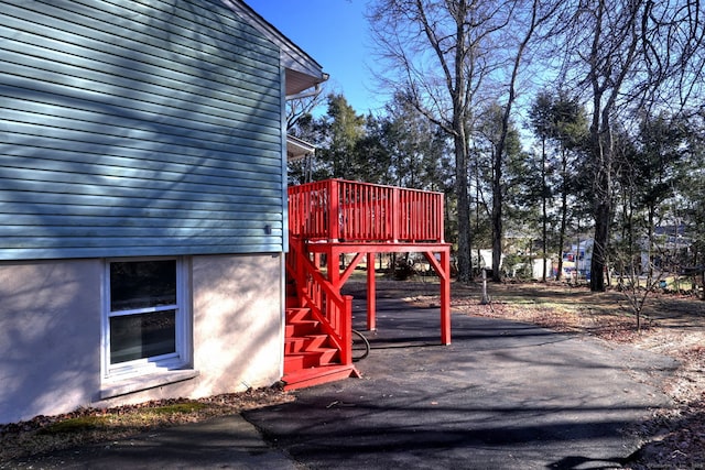 view of home's exterior with a deck