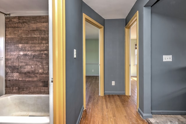 hallway featuring hardwood / wood-style flooring