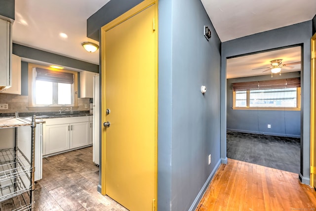 hall featuring wood-type flooring